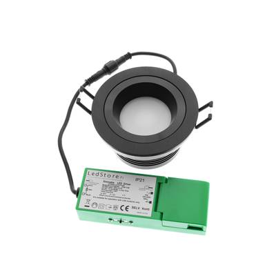 Downlight LED empotrable negro con controlador LED verde y cable negro sobre fondo blanco: una solución de iluminación energéticamente eficiente.