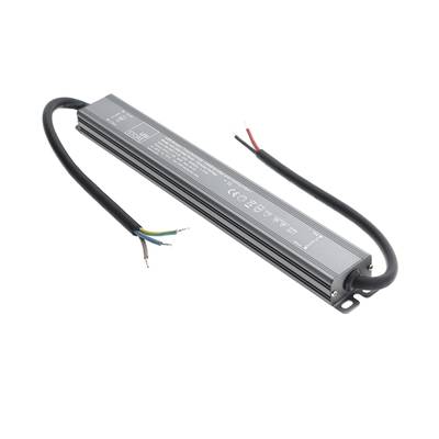 Primer plano del controlador LED regulable Silver TRAC con dos cables, con etiquetas de producto para soluciones de iluminación.