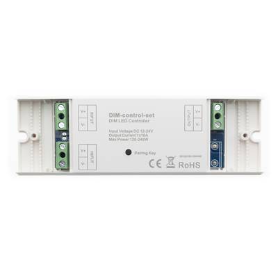 Controlador DIM LED blanco rectangular, conexiones de entrada/salida, información de iluminación en el centro de la carcasa.