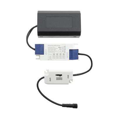 Texto alternativo: "Componentes de iluminación LED: caja negra, driver LED blanco y azul y pequeño interruptor blanco con cables para una conexión eléctrica eficaz.
