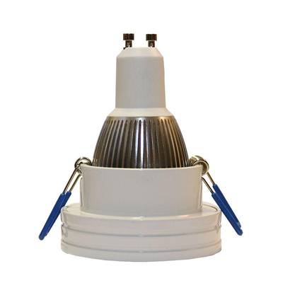 Texto alternativo: 'Foco LED blanco y plata de bajo consumo con dos soportes azules en la base, ideal para soluciones de iluminación contemporáneas.