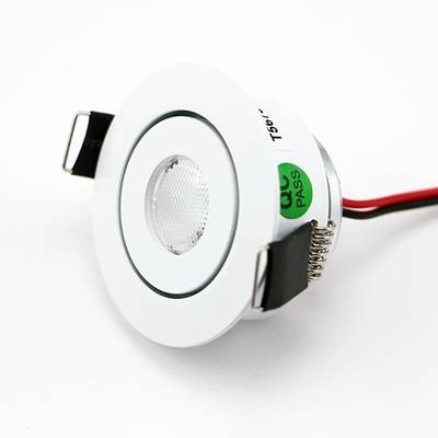 Texto alternativo: Módulo LED redondo blanco con soportes negros, cables rojos y negros unidos - perfecto para soluciones de iluminación eficientes.