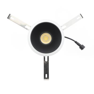 Plafón redondo empotrable con interior negro, bombilla visible, soportes de montaje metálicos y cable alargador. Ideal para sistemas de iluminación modernos.