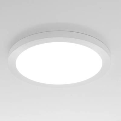 Plafón LED blanco redondo que ilumina un techo blanco.