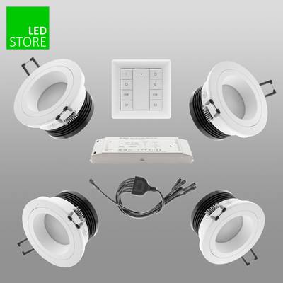 Texto alternativo optimizado para SEO: "Kit de iluminación LED: 4 luces empotradas blancas, panel de control, fuente de alimentación sobre fondo gris.