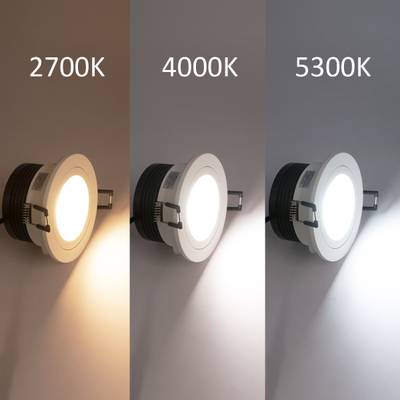 Tres downlights uno al lado del otro con iluminación cálida de 2700K, neutra de 4000K y blanca fría de 5300K.