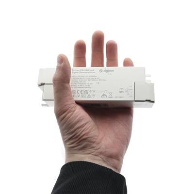 Controlador portátil de iluminación LED con símbolos y texto impresos para soluciones eficaces de iluminación inteligente.