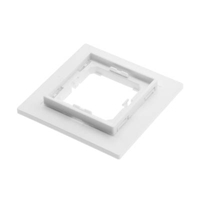 Texto alternativo: Marco de luz LED cuadrado de plástico blanco con recortes en el centro sobre fondo plano, ideal para soluciones de iluminación modernas y diseño minimalista.