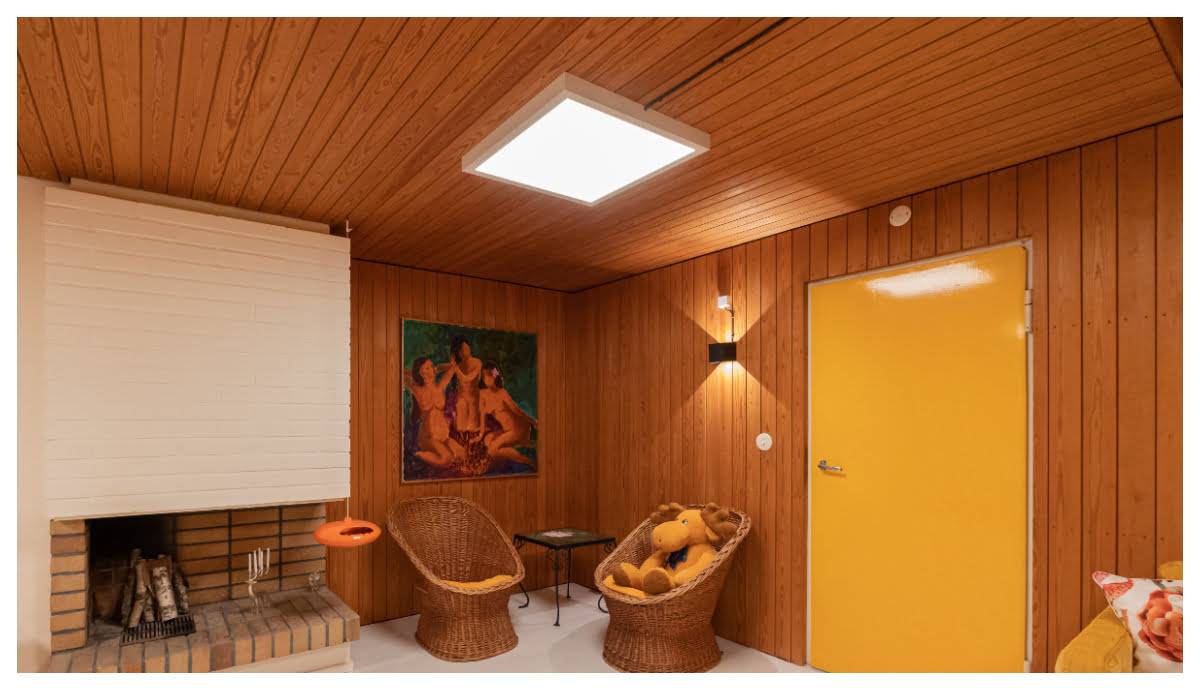 Renovación del espacio de piscina y chimenea de una casa adosada de los años 60 Panel led 600 y aplique funk en la sala de la chimenea. LedStore.fi