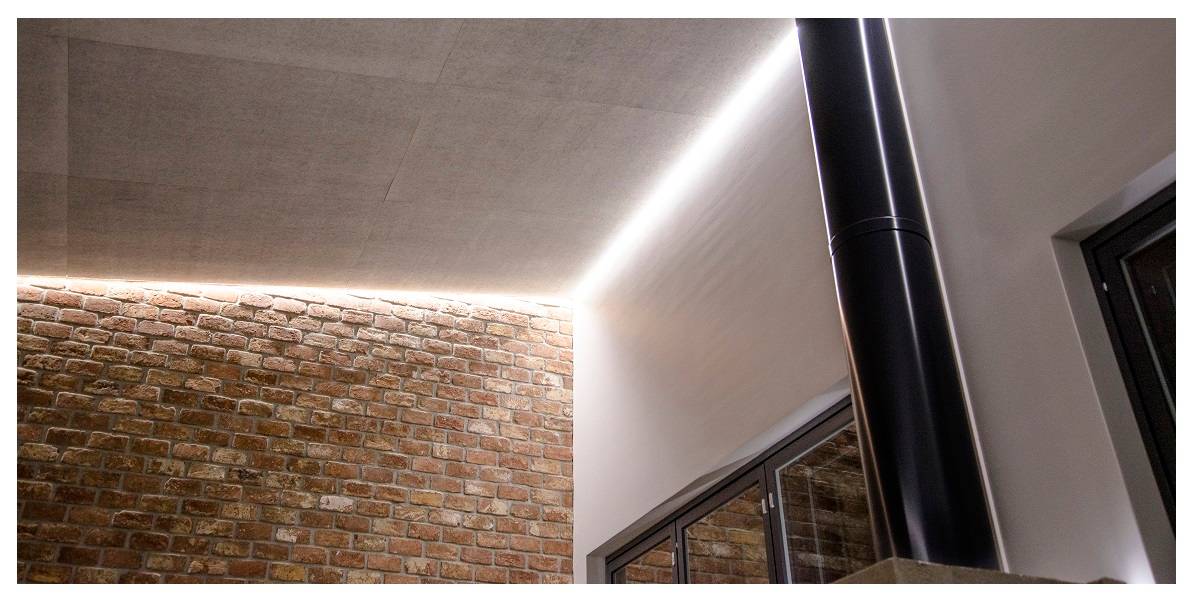 Las vigas del tejado se quedan cortas en la iluminación de la sala de estar