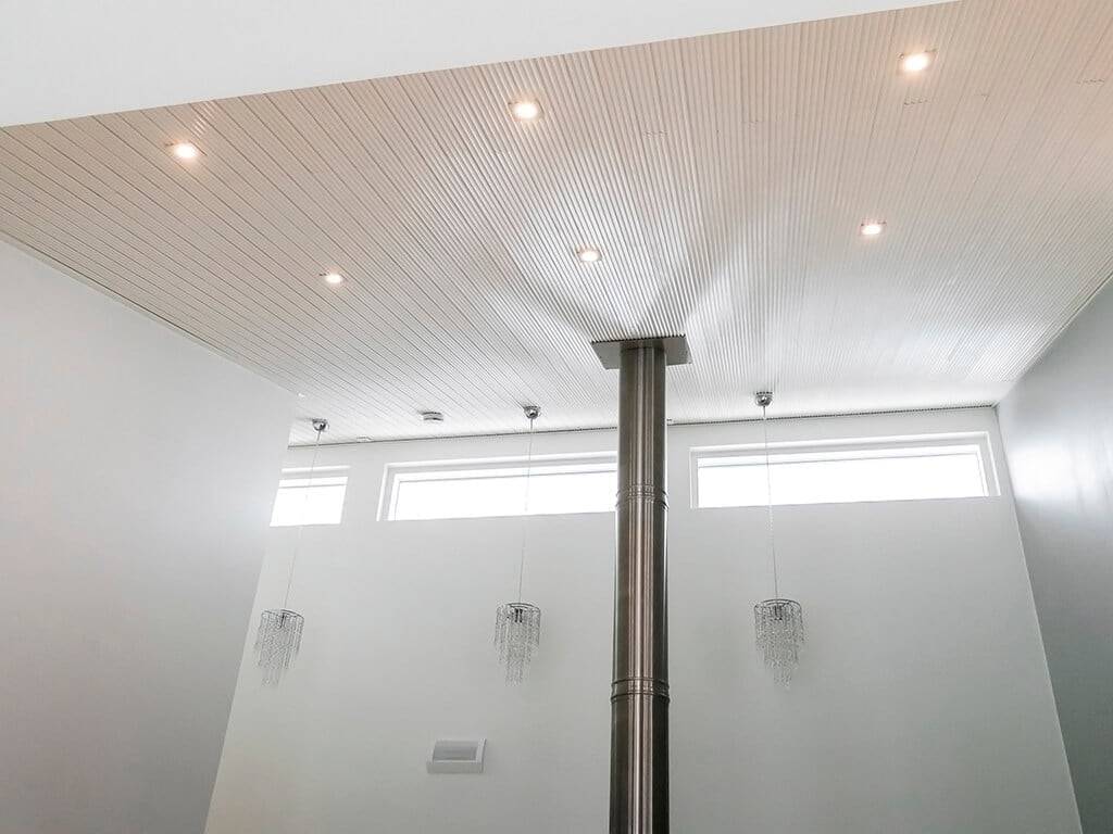 Texto LED STORE sobre cuadrado blanco, fondo verde - marca de tienda de iluminación LED, rótulos de iluminación ecológicos.